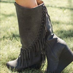 Tall grey fringe boots